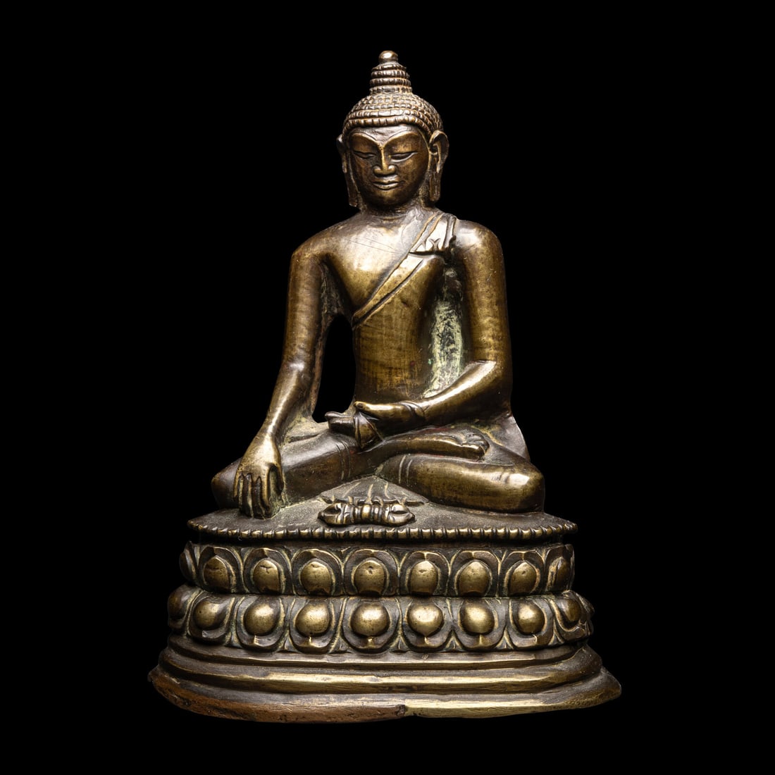 A Sino-Tibetan Bronze Buddha, 18th-19th Century 十八-十九世紀: A Sino-Tibetan Bronze Buddha, 18th-19th Century 十八-十九世紀 銅坐佛 18th-19th Century The figure portrayed seated in dhynasana on a double lotus 