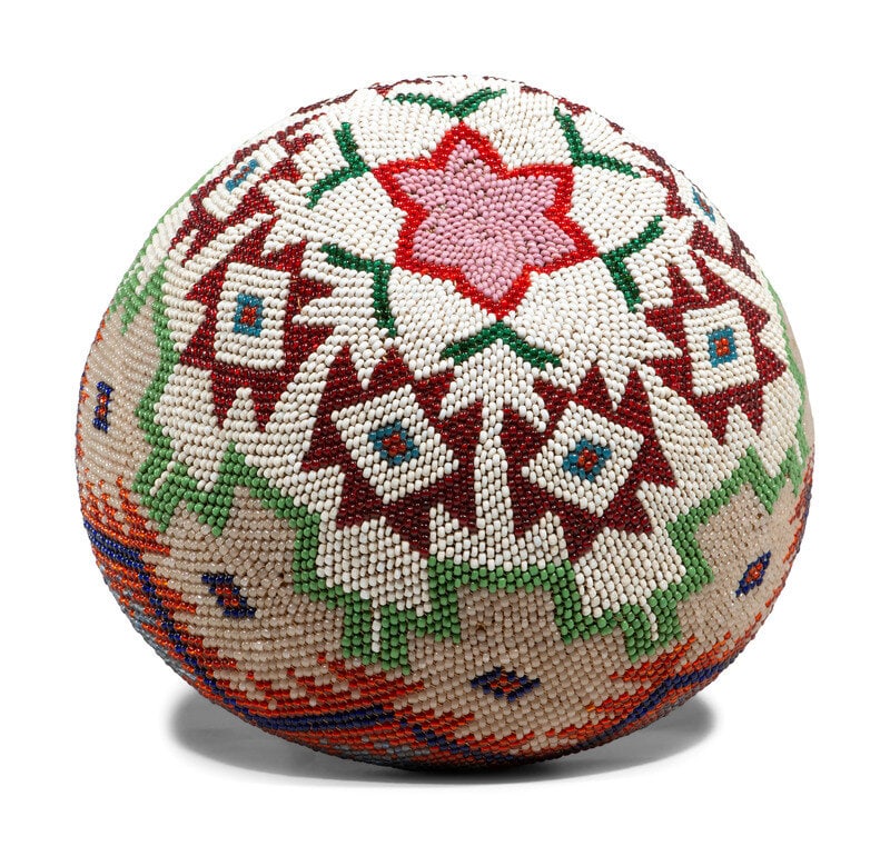 Cecilia Arnot (Paiute, 20th century) Beaded Basket: Cecilia Arnot (Paiute, 20th century) Beaded Basket having an exterior floral design with colors of pink, red, white, rose, greasy blue, pea green, translucent green, amber, and clear height 3-3/4 inch