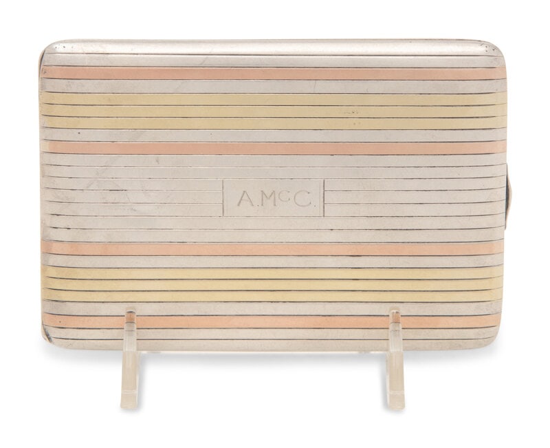 An American Silver and 14-Karat Gold Cigarette Case: An American Silver and 14-Karat Gold Cigarette Case Napier Co., Meriden, CT, Circa 1930 the case centered with an engraved monogram 'A. McC' within a rectangular cartouche. marked 'Sterlin