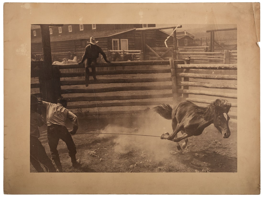 [WESTERN AMERICANA]. BELDEN, Charles J. (1888-1963), photographer. Silver gelatin photograph of a: [WESTERN AMERICANA]. BELDEN, Charles J. (1888-1963), photographer. Silver gelatin photograph of a cowboy roping a horse. Pitchfork, WY, ca 1920s-1930s. 12 x 15 3/4 in. silver gelatin photograph (inclu