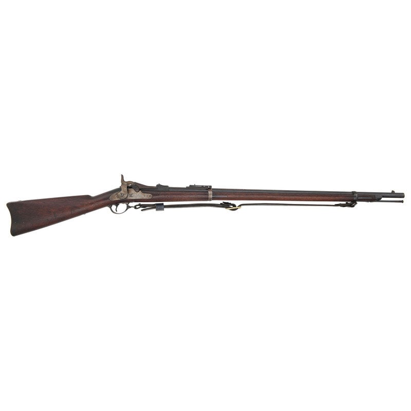 US Model 1884 Springfield Trapdoor Rifle: US Model 1884 Springfield Trapdoor Rifle Indian Wars .45-70. 32.5" barrel length. SN: 472900. Blued finish with case colored breechblock set in walnut straight wrist stock with full length upper handg
