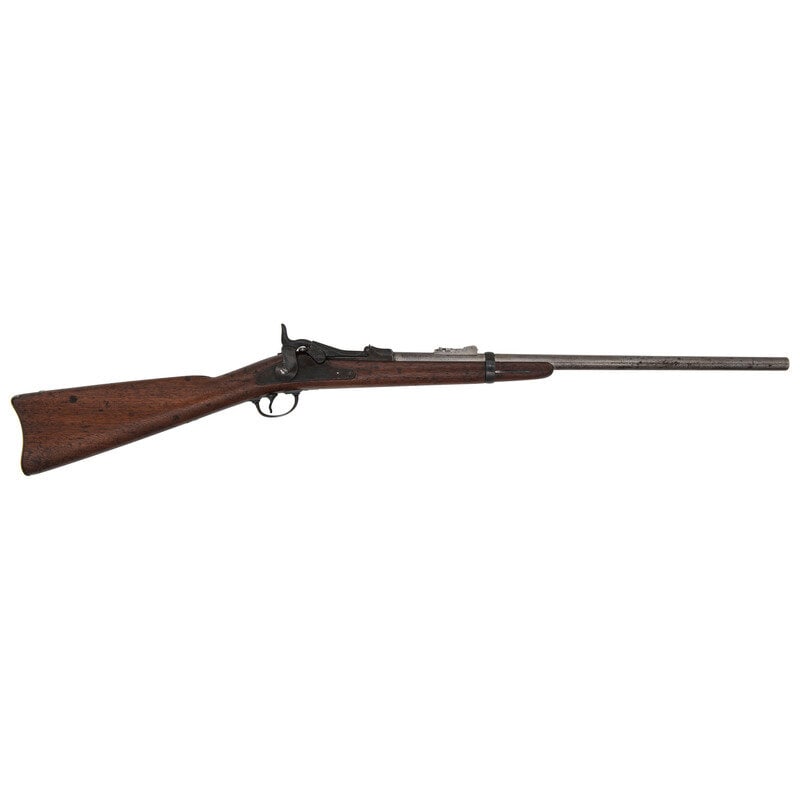 Composite Trapdoor Carbine: Composite Trapdoor Carbine .45-70. 23.25" barrel length. SN: 125883. Case colored breechblock with blued finish to remaining parts and the barrel and rear sight left in the white. Single shot trapdoor