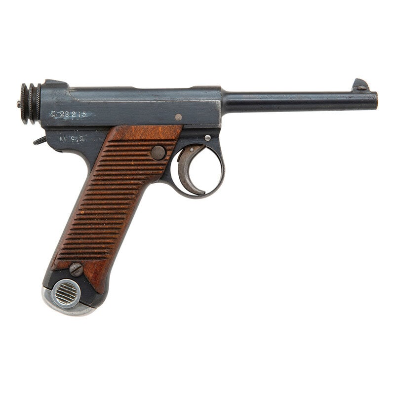 **Nambu Type 14: **Nambu Type 14 World War II 8x22mm Nambu. 4.61" barrel length. SN: 28215. Blued metal finish with straw colored small parts and polished bolt and interior surfaces mounting horizontally serrated wood