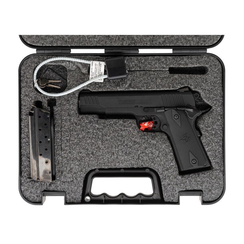 *Taurus 1911 9mm in Box with Accessories: *Taurus 1911 9mm in Box with Accessories 9mm Para. 5" barrel length. SN: ACC604116. Parkerized metal finish with matte barrel mounting black diamond checkered synthetic Taurus logo grips. Short recoil