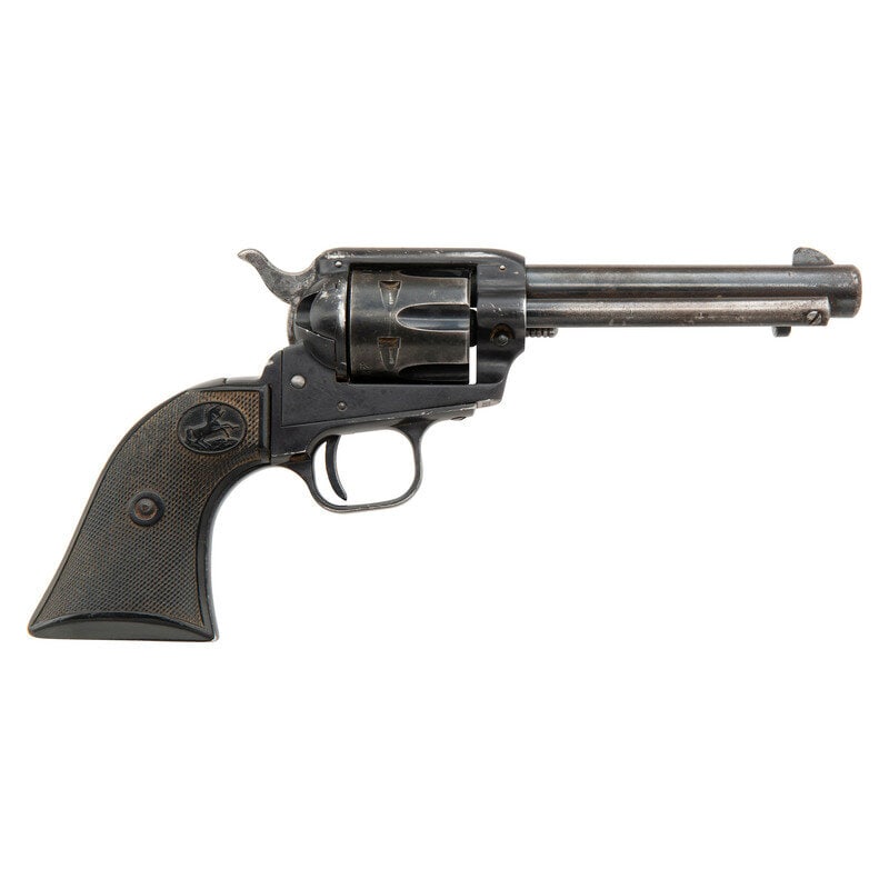 **Colt Single Action Frontier Scout .22: **Colt Single Action Frontier Scout .22 .22 LR. 4.75" barrel length. SN: 230715F. Blued metal finish mounting checkered black synthetic {Rampant Colt} logo grips with topstrap notch and front blade si