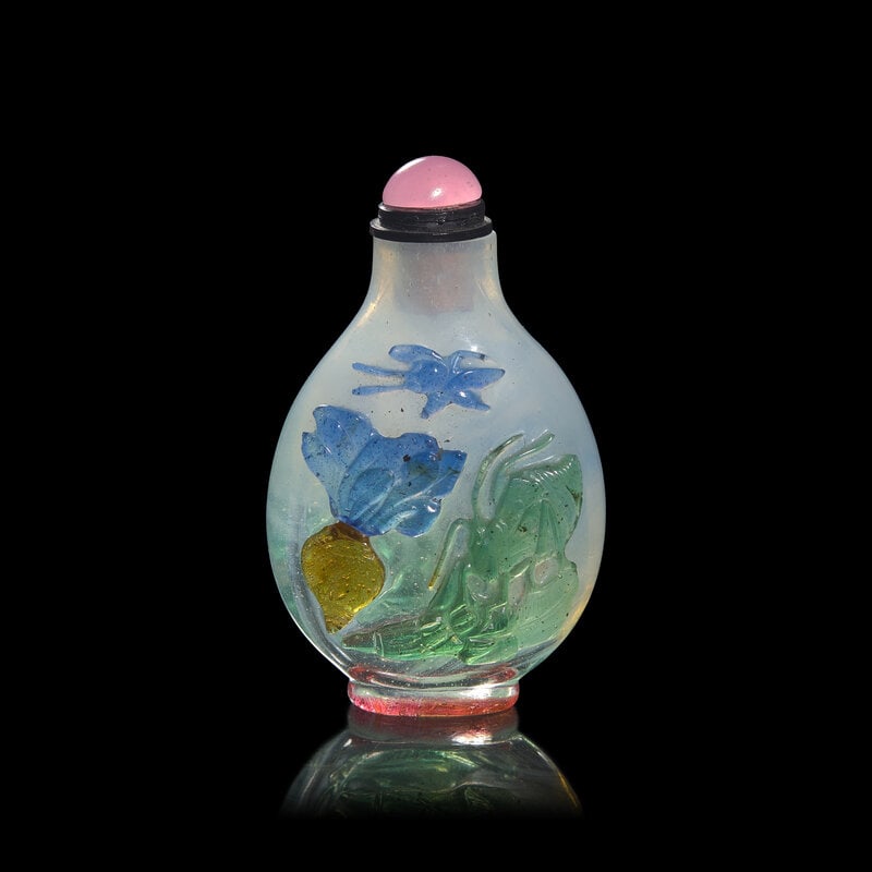 A Chinese Carved Multicolor Overlaid Glass Snuff Bottle (1 of 2)