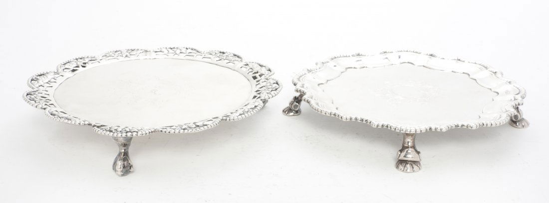 A George II Silver Salver, Robert Abercromby, Diamet: A George II Silver Salver, Robert Abercromby, London, 1742, of circular form with a scalloped edge centered with a cartouche, raised on four feet, together with another example by Ebenezer Coker, Lond