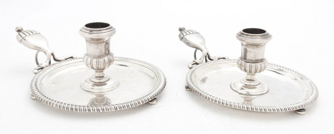 A Pair of Victorian Silver Chambersticks, Charles: A Pair of Victorian Silver Chambersticks, Charles Stuart Harris, London, 1897, each of circular form with gadrooned borders, raised on three pad feet; approximate total weight 23.19 ozt. Width 8 inche