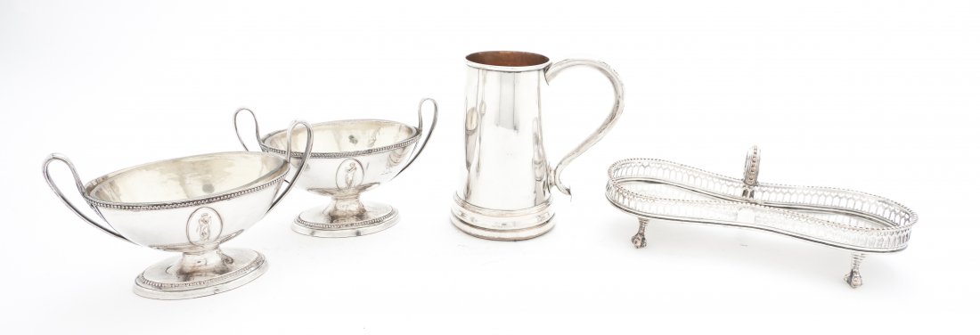 A Collection of Silverplate Articles, Width of wid: A Collection of Silverplate Articles, comprising a snuffer tray, a pair of salt cellars and a stein. Width of widest 7 7/8 inches.