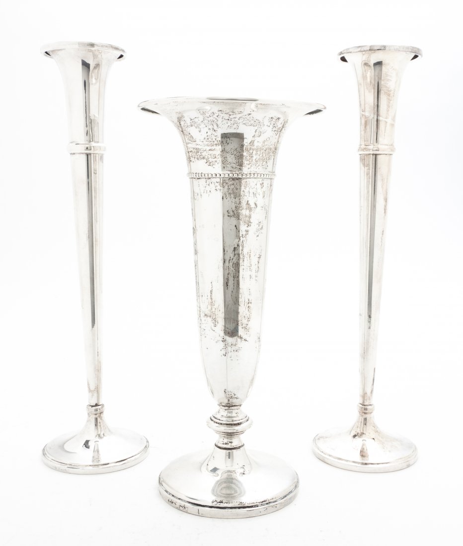 Three American Sterling Silver Trumpet Vases, Mars: Three American Sterling Silver Trumpet Vases, Marshall Fields and Baldwin & Miller Inc., the first a single with beaded decoration, the second a pair, each weighted. Height of taller 10 inches. Proper