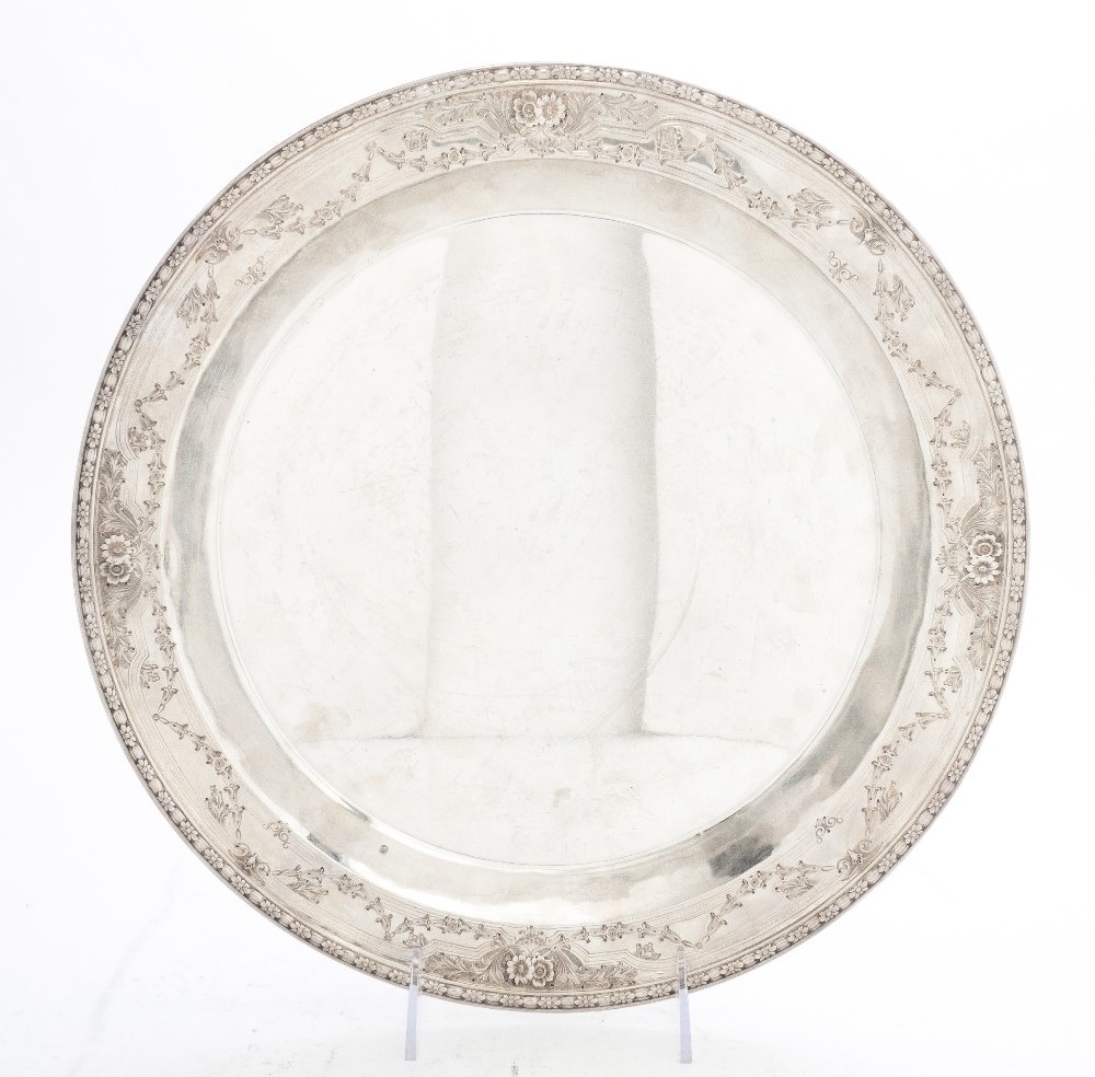 An American Sterling Silver Charger, Watson Compan: An American Sterling Silver Charger, Watson Company, in the Lorraine pattern, of circular form with a foliate and bellflower swag border, bearing standard marks and numbered 9335, 13; approximate weig