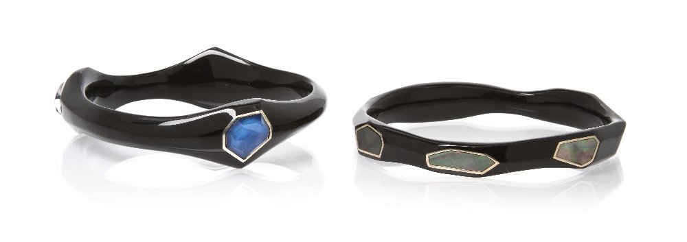 A Pair of Resin, Sterling Silver and Gem Bangle Br: A Pair of Resin, Sterling Silver and Gem Bangle Bracelets, Ippolita, consisting of two black resin bracelets, one containing three mother-of-pearl backed rose cut rock crystal bezel set in silver, the