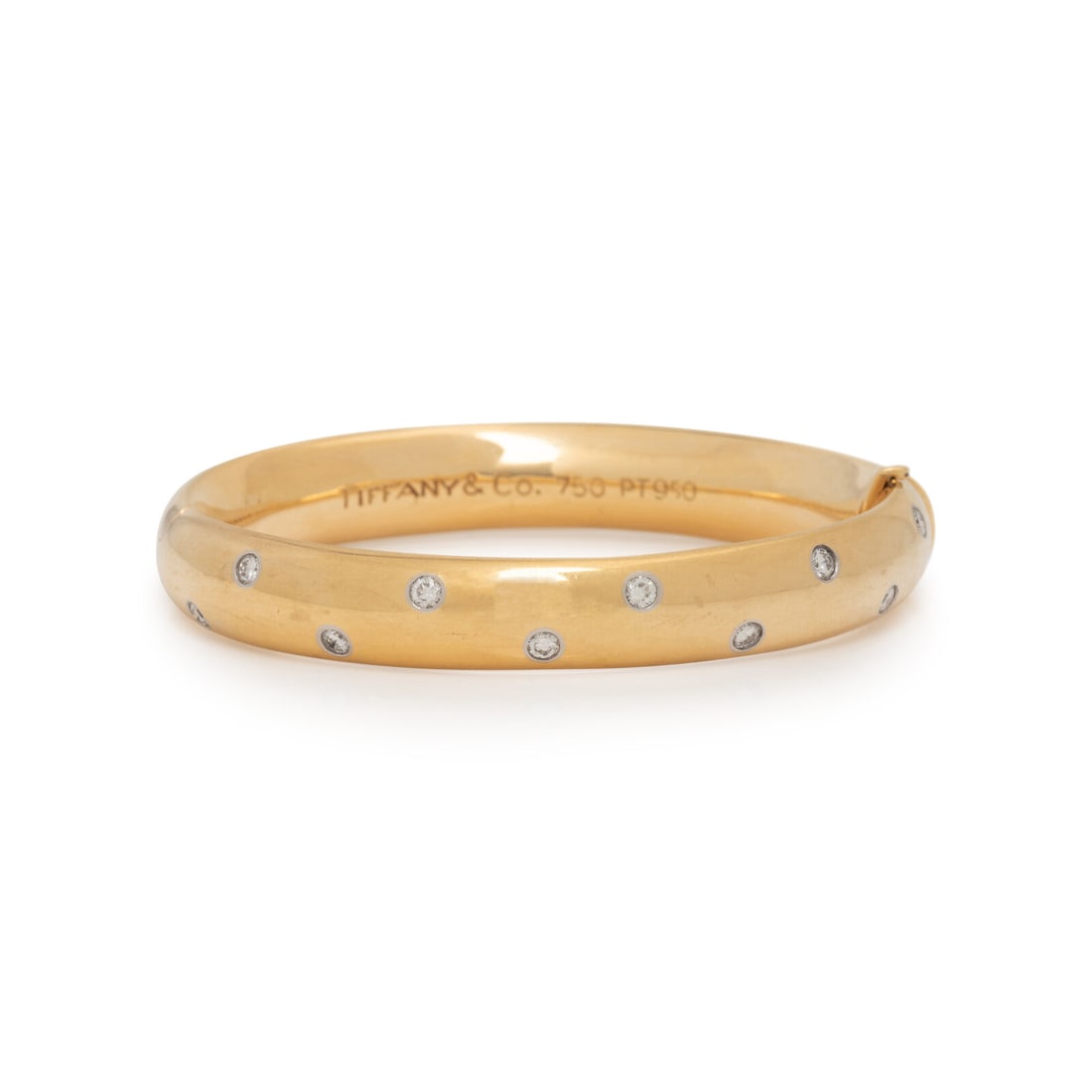 TIFFANY & CO., YELLOW GOLD AND DIAMOND 'ETOILE' BANGLE BRACELET (1 of 2)