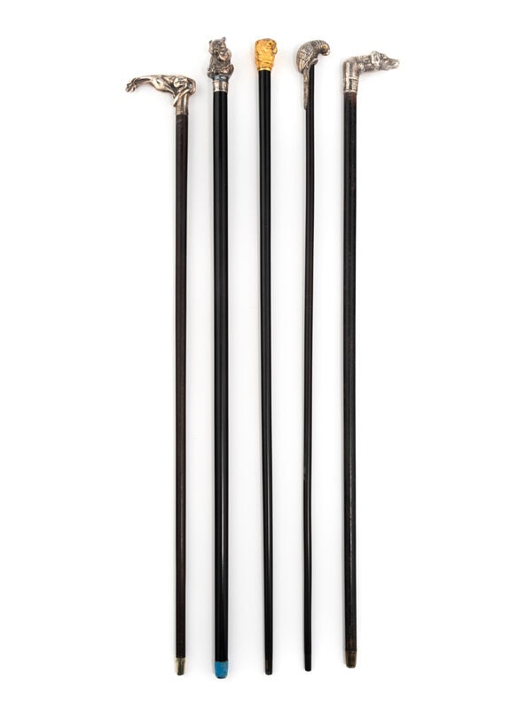 A Group of Five Silver Mounted Zoomorphic Form Walking Sticks (1 of 13)