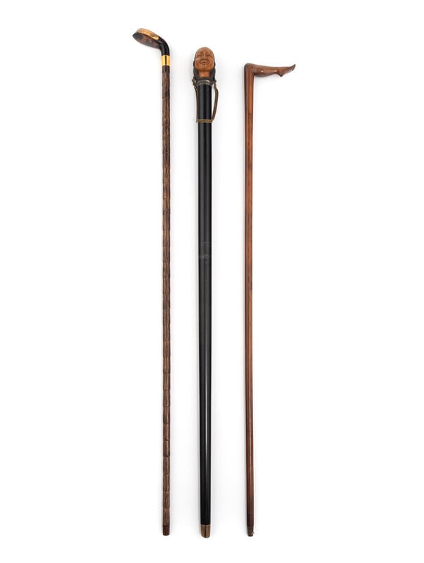 A Group of Three Carved Wood and Tortoise Shell Walking Sticks (1 of 13)
