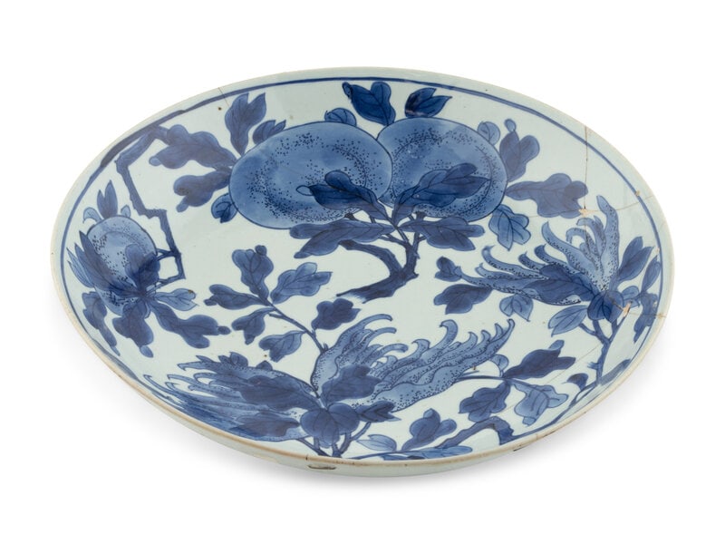 A Chinese Blue and White Porcelain Charger: A Chinese Blue and White Porcelain Charger Kangxi Period (1662-1722) 3 ½ in., 14 ¼ in. diameter. This lot is located in Chicago. Property from the Collection of Dr. James Dew,
