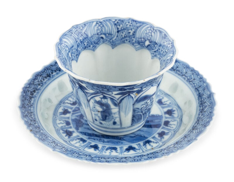 A Chinese Export Blue and White Porcelain Cup and Saucer: A Chinese Export Blue and White Porcelain Cup and Saucer 18th Century Diameter 4 1/4 inches. This lot is located in Chicago. Property from the Collection of Dr. James Dew, Atlanta,