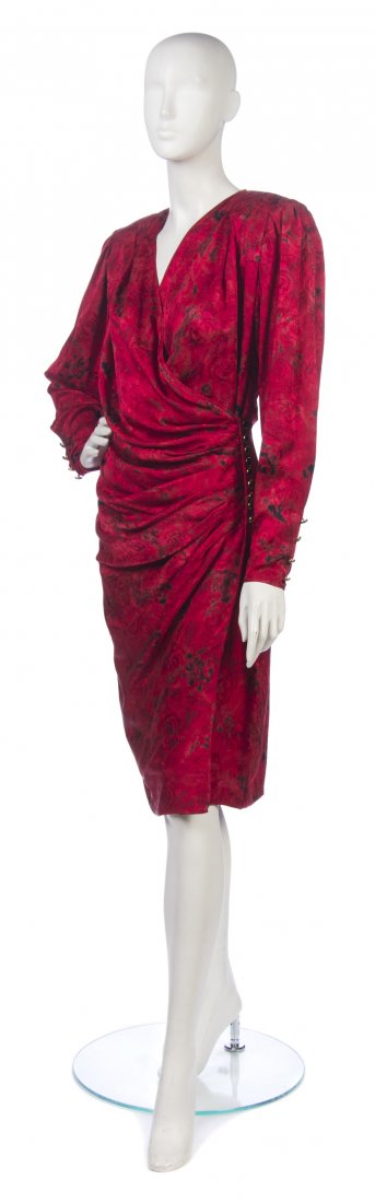 An Emanuel Ungaro Red Printed Silk Cocktail Dress, : An Emanuel Ungaro Red Printed Silk Cocktail Dress, allover rose pattern. Labeled: Emanuel Ungaro Parallele. Size 12. Property from the Estate of Eunice Johnson, Chicago, Illinois