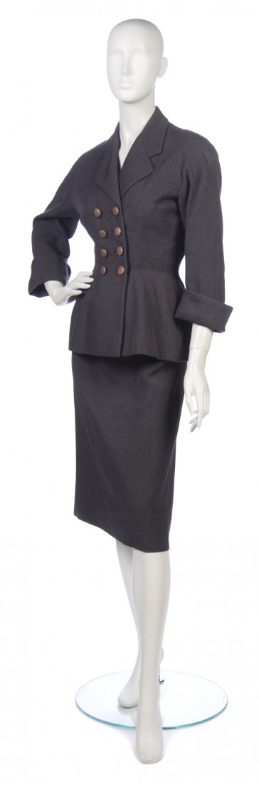 A Balenciaga Gray Wool Skirt Suit,: A Balenciaga Gray Wool Skirt Suit, 1950s, New Look silhouette gold tone buttons. Labeled: Balenciaga / 40704.