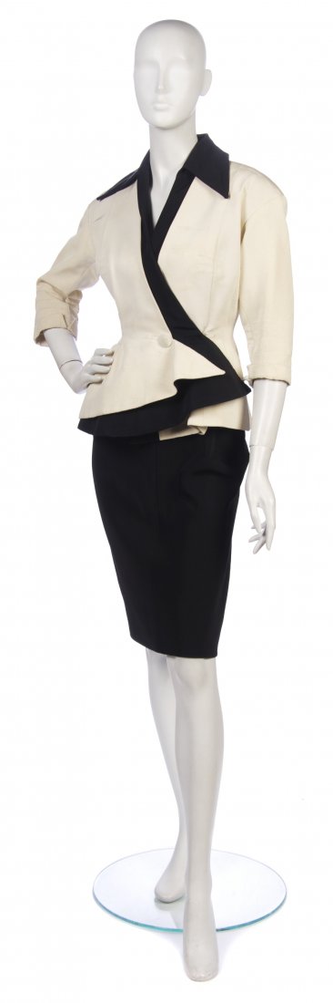 A Jeanne Paquin Cream and Black Corded Silk Skirt S: A Jeanne Paquin Cream and Black Corded Silk Skirt Suit, circa 1950, cream jacket body with black trim together with black skirt. Labeled: Paquin / 791V3 (partially obscured).