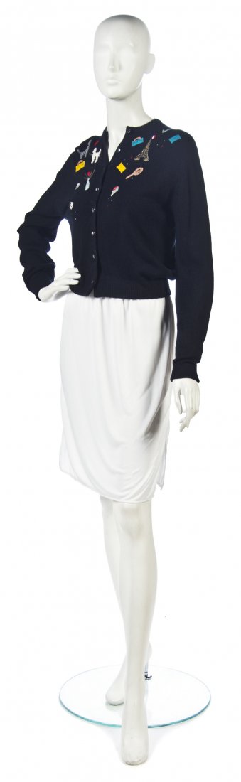 An Elsa Schiaparelli 'Poodle' Sweater,: An Elsa Schiaparelli 'Poodle' Sweater, with leisure motif embroidery to bust. Labeled: Schiaparelli / B. Altman & Co. Property from a New York City Collection