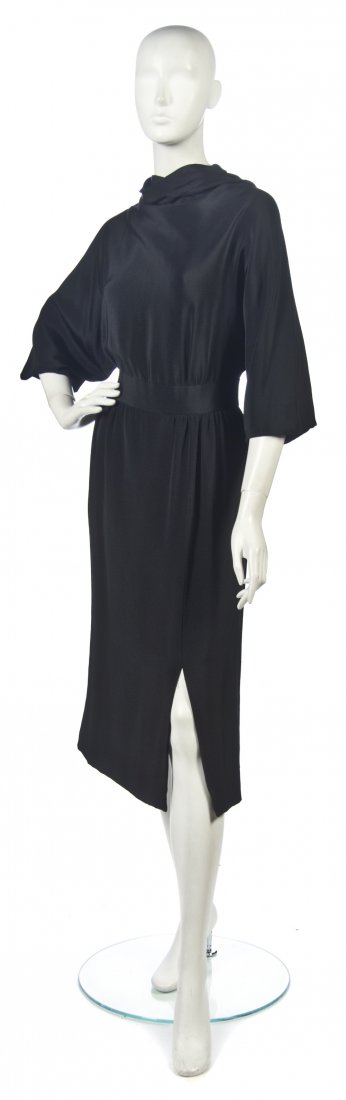 A Pauline Trigere Black Silk Dress,: A Pauline Trigere Black Silk Dress, stole collar, banded waist, keyhole back. Labeled: Pauline Trigere for Bergdorf Goodman / Jane H. Rumland 27418-10 9-23-76. Property from a New York City Collection