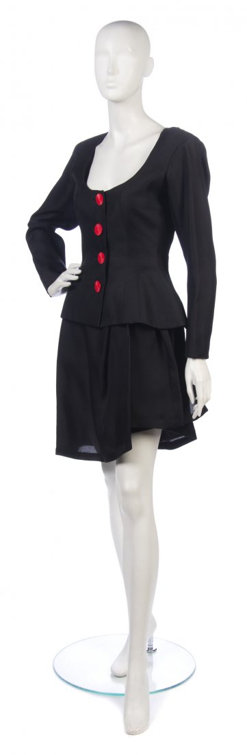 An Yves Saint Laurent Black Silk Skirt Suit, Size : An Yves Saint Laurent Black Silk Skirt Suit, with red swirl buttons. Labeled: Yves Saint Laurent. Size 36.