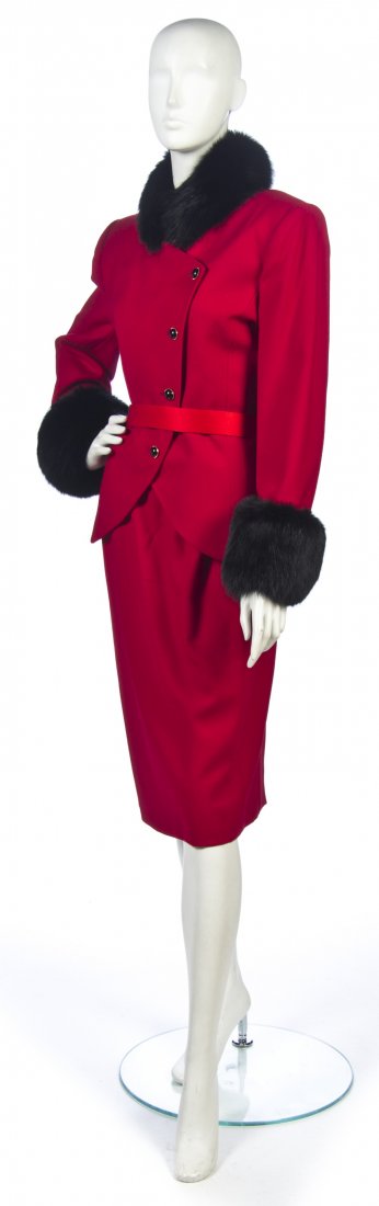 A Nolan Miller Red Wool Skirt Suit, Size 14.: A Nolan Miller Red Wool Skirt Suit, black fox fur trim. Labeled: Nolan Miller. Size 14. Property from the Estate of Sandra Miller, New Orleans, Louisiana