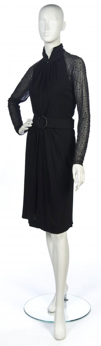 A Bob Mackie Black Cocktail Dress,: A Bob Mackie Black Cocktail Dress, sheer bodice in Swiss dot pattern with black rhinestones, together with accompanying belt. Labeled: Bob Mackie.