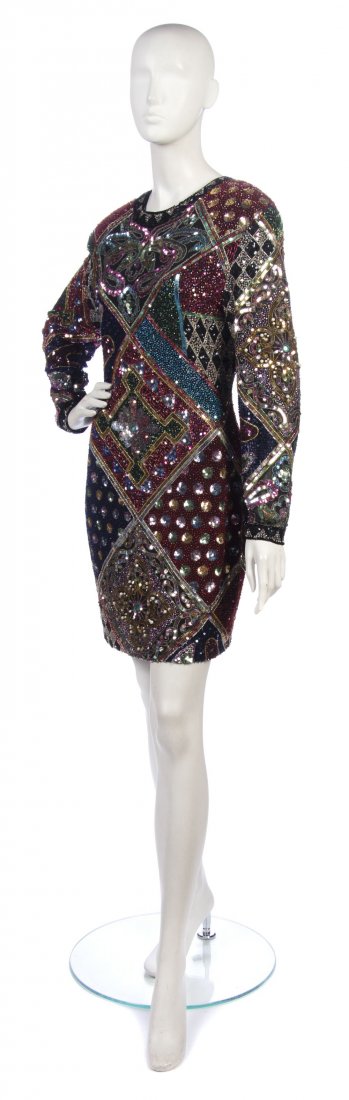 A Riazee Multicolor Sequin Cocktail Dress, Size 14: A Riazee Multicolor Sequin Cocktail Dress, with allover sequins and beading in various geometric and paisley patterns. Labeled: Naeem Khan Riazee Nights. Size 14. Property from a New York City Collect