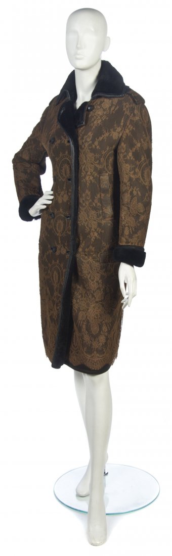 A Gianni Versace Lace and Leather Jacket,: A Gianni Versace Lace and Leather Jacket, black leather with olive lace overlay, black shearling lining. Labeled: Gianni Versace.