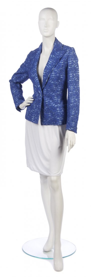 A Gianni Versace Blue Lace and Leather Jacket,: A Gianni Versace Blue Lace and Leather Jacket, light blue leather and royal blue lace overlay. Labeled: Gianni Versace.