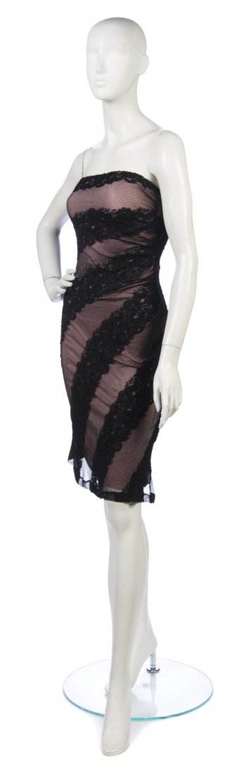 A Gianni Versace Couture Black Lace Dress,: A Gianni Versace Couture Black Lace Dress, strapless, pink underlay, very fitted. Labeled: Gianni Versace Couture. Property from a New York City Collection