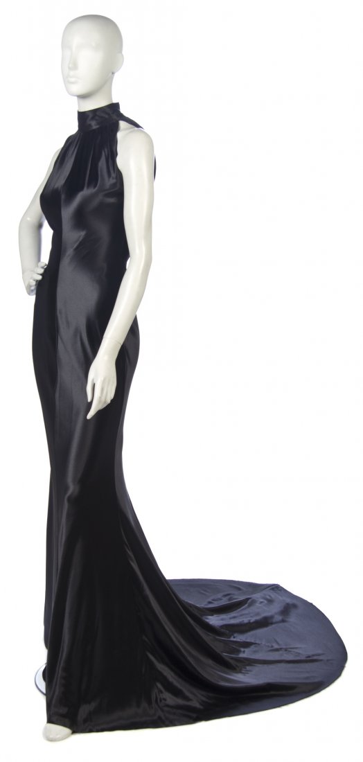A Gucci Black Silk Evening Gown,: A Gucci Black Silk Evening Gown, Tom Ford for Gucci, halter neckline, stand collar, bias cut with train. Unlabeled. Property from a New York City Collection