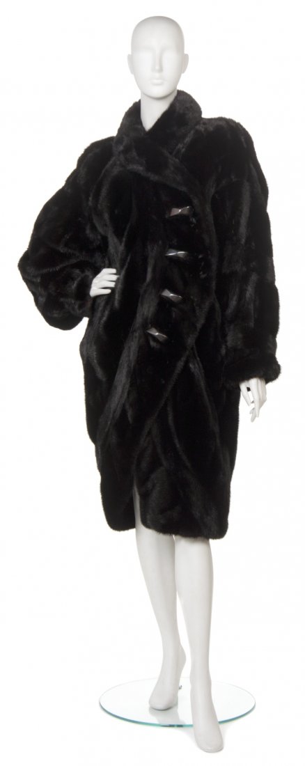 A Fendi Black Mink Fur Coat.: A Fendi Black Mink Fur Coat. Labeled: Fendi / The Carol and Irwin Ware Fur Collection at I. Magnin.