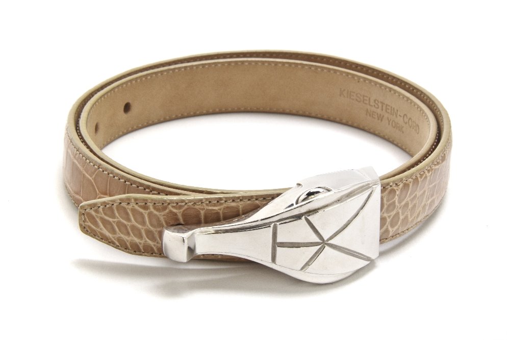 A Kieselstein Cord Sterling Silver Alligator Head : A Kieselstein Cord Sterling Silver Alligator Head Belt Buckle, beige American alligator strap. Buckle stamped: 133 B. Kieselstein-Cord 2001 D (star) 925. Property from a New York City Collection