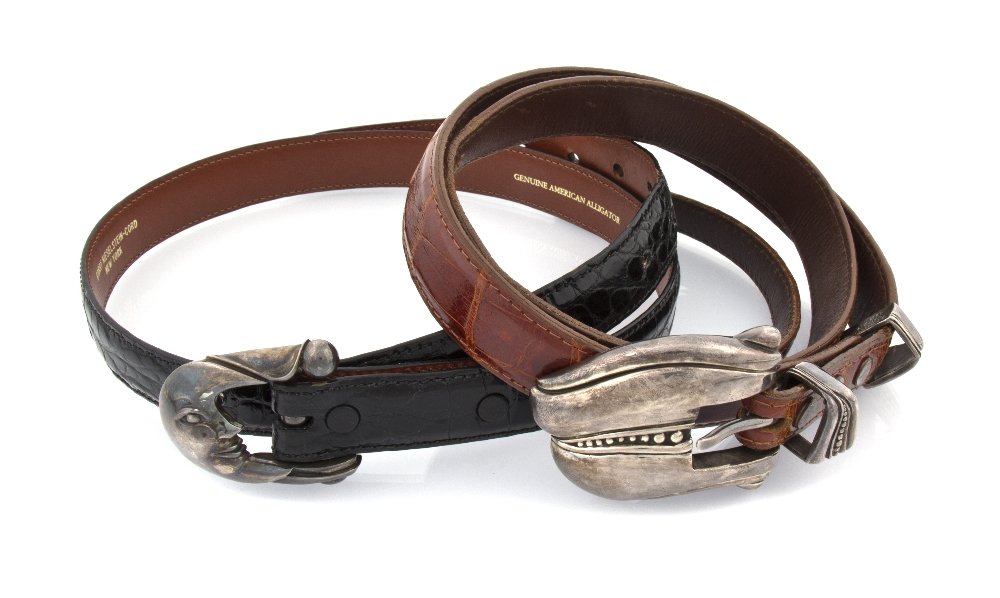 Two Barry Kieselstein-Cord Alligator Belts,: Two Barry Kieselstein-Cord Alligator Belts, both with sterling silver buckles, one black and the other cognac. Black belt buckle stamped: Kieselstein-Cord 1986 D (star) USA STERLING. Cognac belt buckl