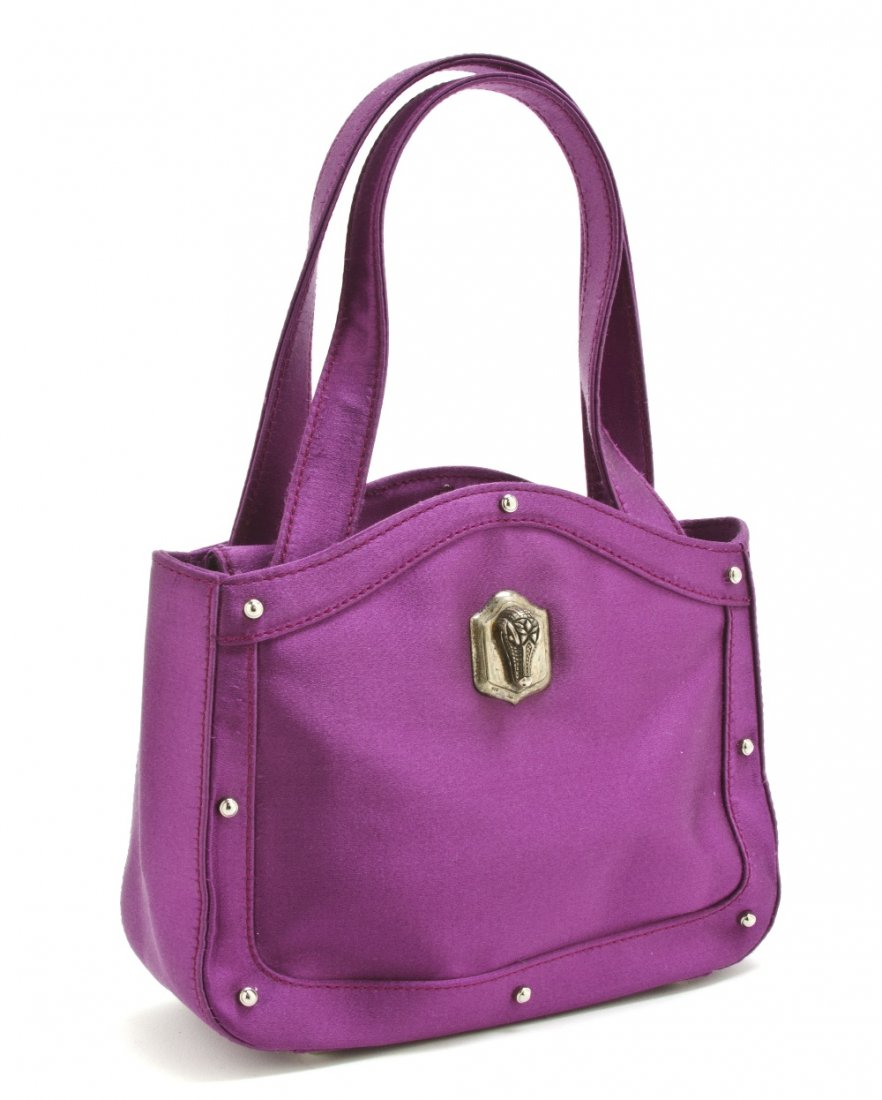 A Barry Kiselstein-Cord Purple Silk Purse,: A Barry Kiselstein-Cord Purple Silk Purse, 1991, with alligator head plaque on front with silvertone rivet detail around border. Stamped: Barry Kieselstein-Cord. Property from a New York City Collecti