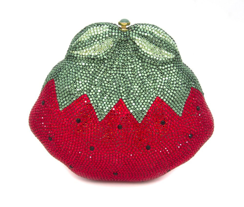 A Judith Leiber Crystal Strawberry Minaudiere,: A Judith Leiber Crystal Strawberry Minaudiere, green and red crystals with larger black crystals as the seeds, green cabochon push clasp, goldtone hardware, chainlink hidden shoulder strap, gold kid l