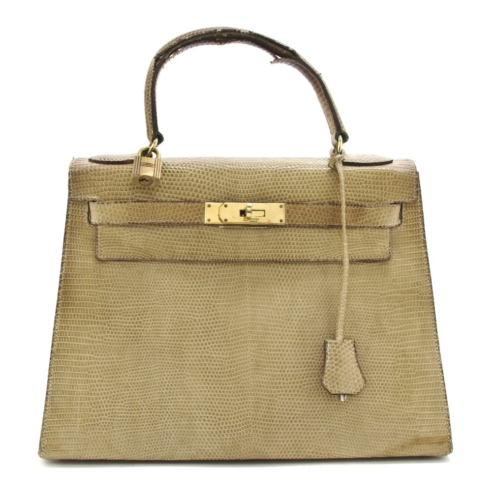 An Hermes Beige Lizardskin Kelly Bag, 29 x 20 x 11: An Hermes Beige Lizardskin Kelly Bag, goldtone hardware, lock and key sheath, blindstamp 3. Stamped: Hermes. 29 x 20 x 11 cm (11 1/2 x 8 x 4 1/2 inches). Property from a Distinguished Private Collecto