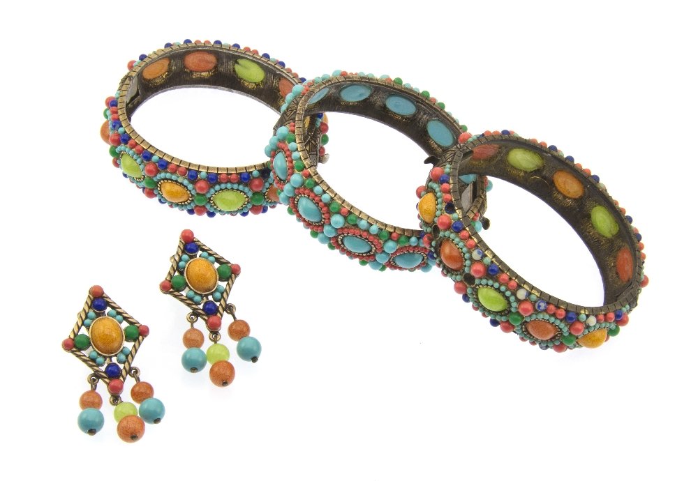 A Group of Hobe Jewelry,: A Group of Hobe Jewelry, comprised of three multigem hinged bangle bracelets and one pair of matching earclips. Stamped: Hobe. Property from an Important Collector, Chicago, Illinois
