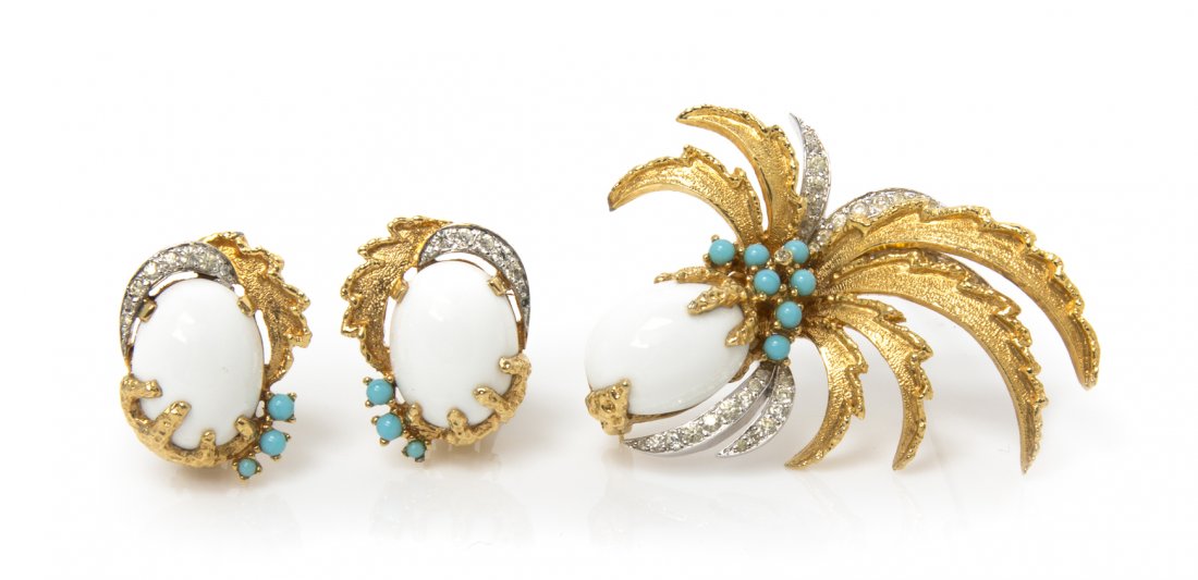A Jomaz Goldtone, Turquoise and Rhinestone Bird Su: A Jomaz Goldtone, Turquoise and Rhinestone Bird Suite, comprised of a brooch and earclips in an abstract bird motif. Stamped: Jomaz. Property from an Important Collector, Chicago, Illinois
