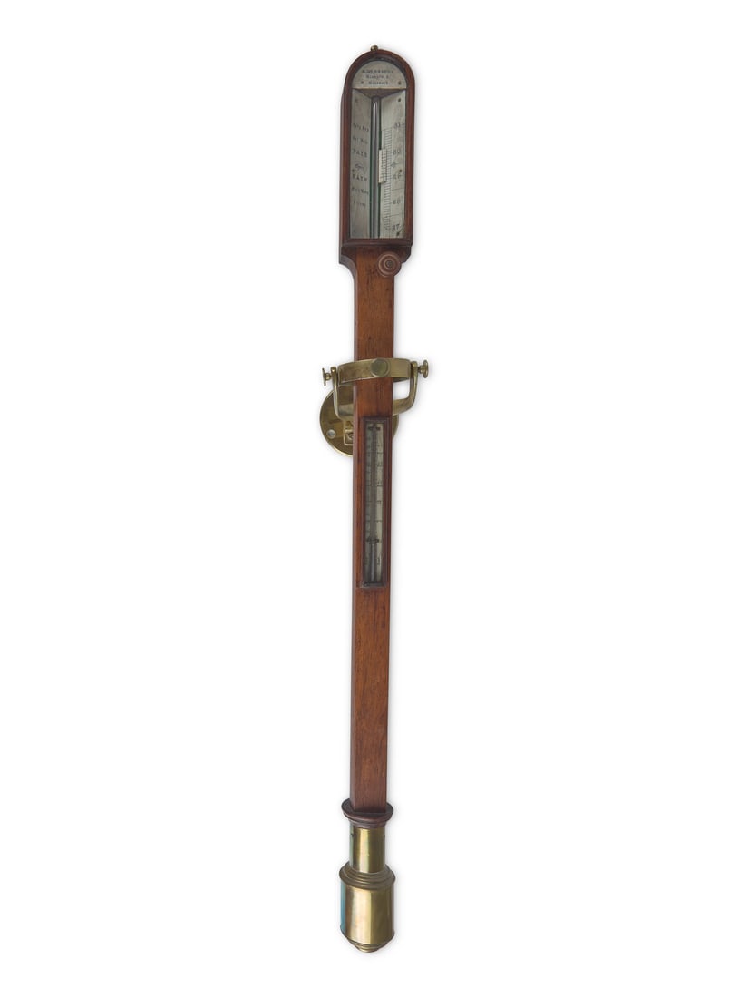 A Mahogany Gimballed Ship's Barometer, Scotland, Circa 1855: A Mahogany Gimballed Ship's Barometer, Scotland, Circa 1855 Bearing maker's label, "D. McGregor Glasgow & Greenock," with original brass gimbal mount. L: 37 in. This lot is located in Philadelphia