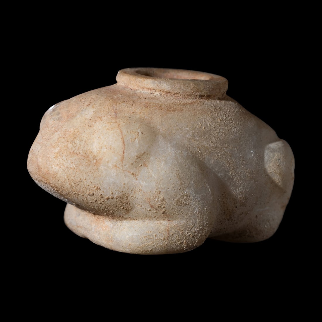 An Egyptian Calcite Frog Vessel: An Egyptian Calcite Frog Vessel Late Predynastic Period, Circa 3500-3000 B.C. Length 2 1/2 inches (6.35 cm). Property from a Private Collection, Chicago, Illinois Provenance: Ancient Works of Art, New