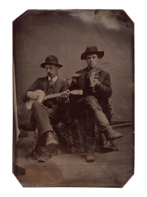 [WESTERN AMERICANA] 5 tintypes of occupational subjects, incl. a blacksmith, musicians, and cowboys (1 of 2)