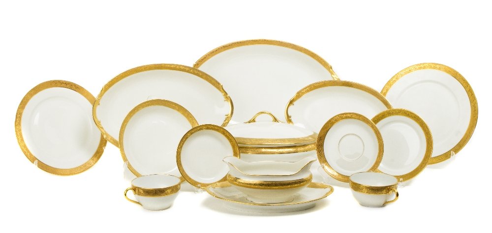 An LS&S Limoges Gold Rimmed Porcelain Partial Dinn: An LS&S Limoges Gold Rimmed Porcelain Partial Dinner Service, comprising 9 tea cups, 10 saucers, 12 small bowls, 11 bread plates, 11 dessert plates, 12 soup bowls, 12 lunch plates, 12 dinner plates, 3