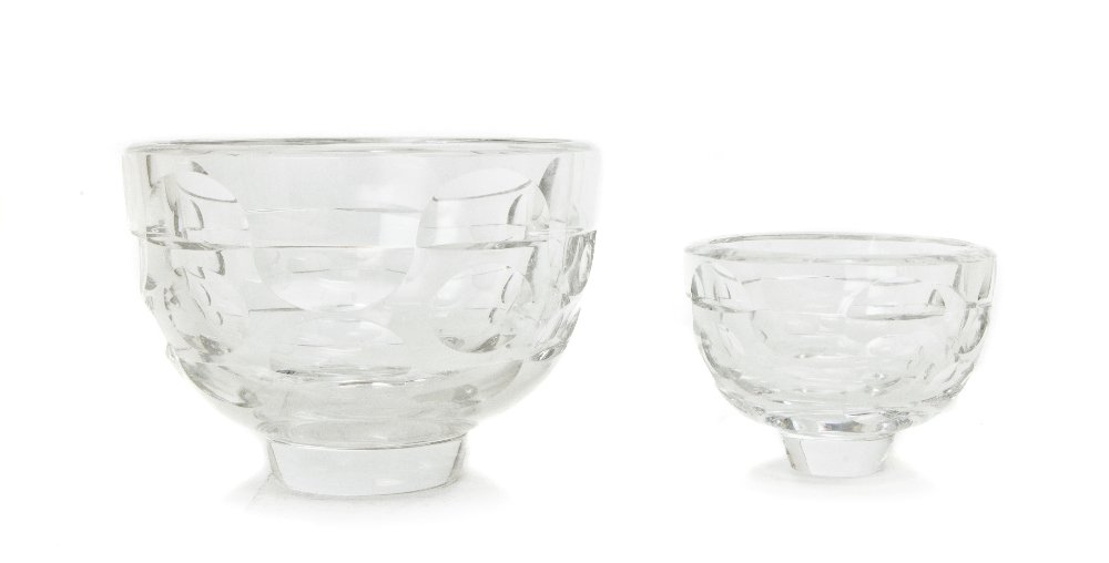 Two Orrefors Bowls, Diameter 7 inches.: Two Orrefors Bowls, designed by Ingeborg Lundin, each having a geometric design and raised on a circular foot. Diameter 7 inches.