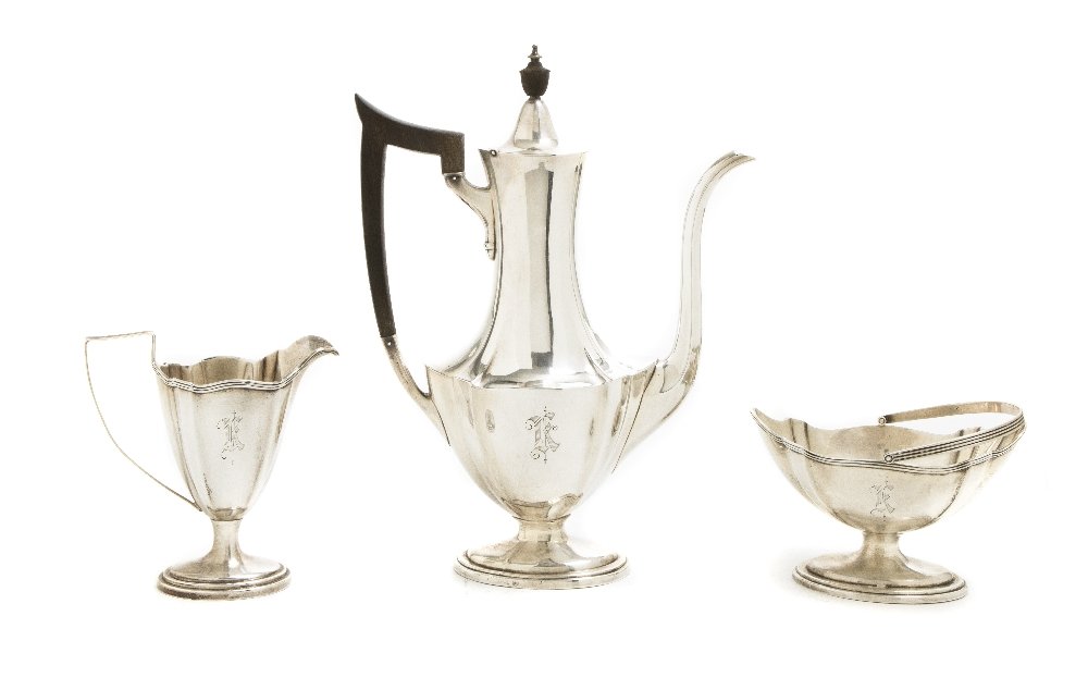 An American Sterling Silver Tea Set, Gorham, Heigh: An American Sterling Silver Tea Set, Gorham, comprising a teapot with wood finial and handle, sugar with swing handle and creamer; approximate weighable 7.6 ozt. Height of first 11 inches. Property fr