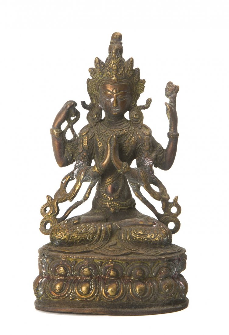 A Central Asian Bronze Seated Deity, Height of fir: A Central Asian Bronze Seated Deity, together with a bronze dressing mirror having a Chinese carved hardstone handle. Height of first 9 1/8 inches. Property from the Collection of A Gentleman, Palm Be