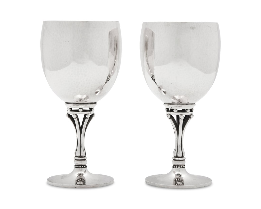 A Pair of Harald Nielsen Designed Georg Jensen Wine Goblets: A Pair of Harald Nielsen Designed Georg Jensen Wine Goblets Copenhagen, Circa 1945-1977 pattern '532C'. marked 'Sterling' on underside 22 ozt 19 dwt Height 6 3/4 inches.